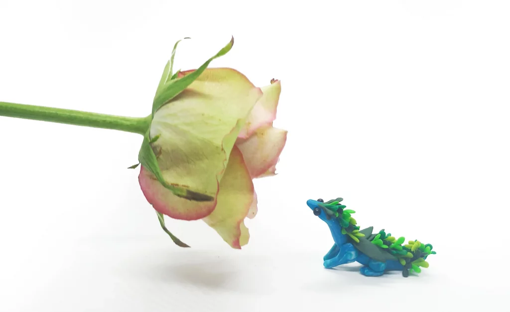 A miniature clay dragon made from polymer clay